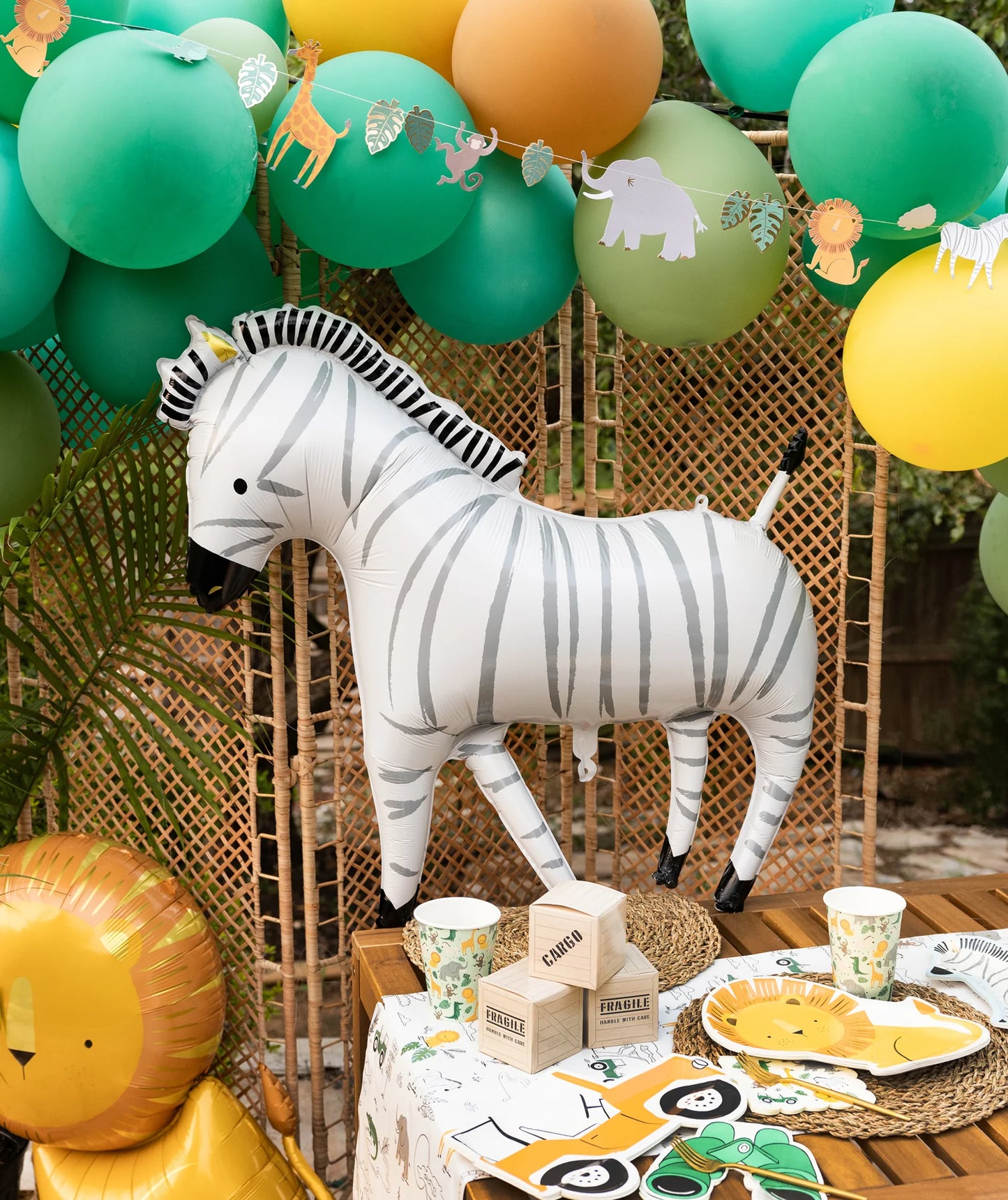 Zebra balloon at a children's party with balloons and decorations in the background