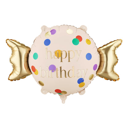 Foil balloon shaped like a candy with 'happy birthday' text and colorful polka dots on a white background