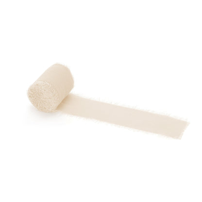 Beige ribbon roll on a white background