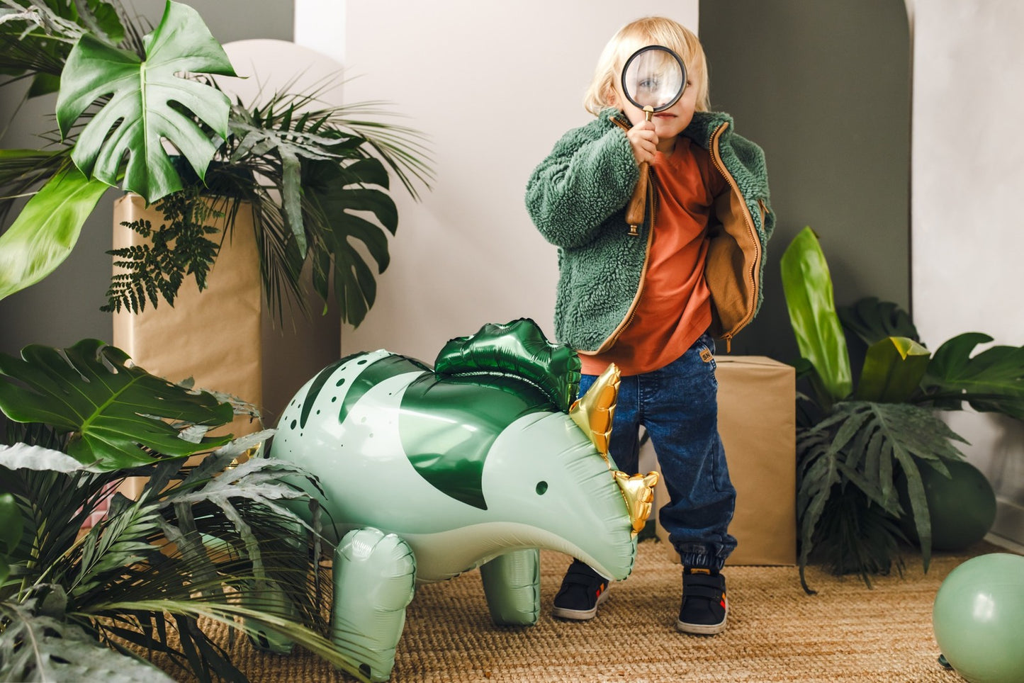 Green Triceratops foil balloon for dinosaur-themed birthday party