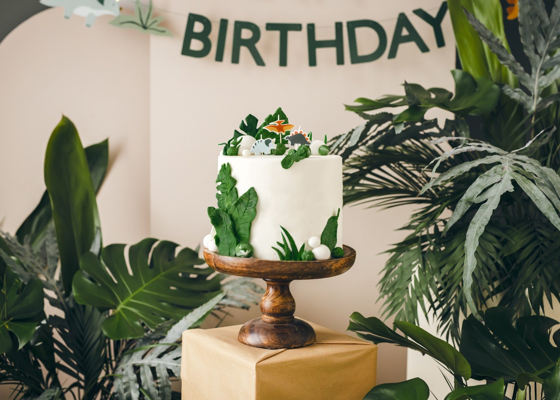 Dinosaur-shaped birthday candles in set of three for dino-themed cake