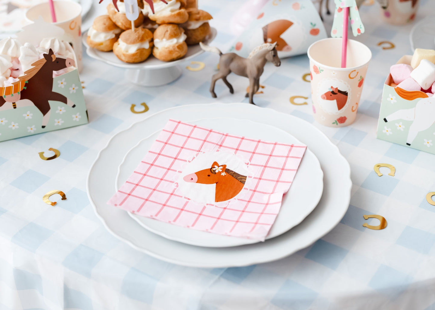 Pink horse napkins with floral design for kids party table