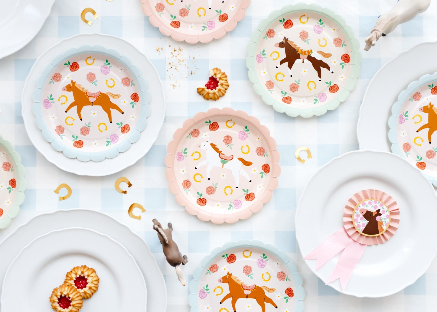 Horse themed paper plates with colorful border for party table