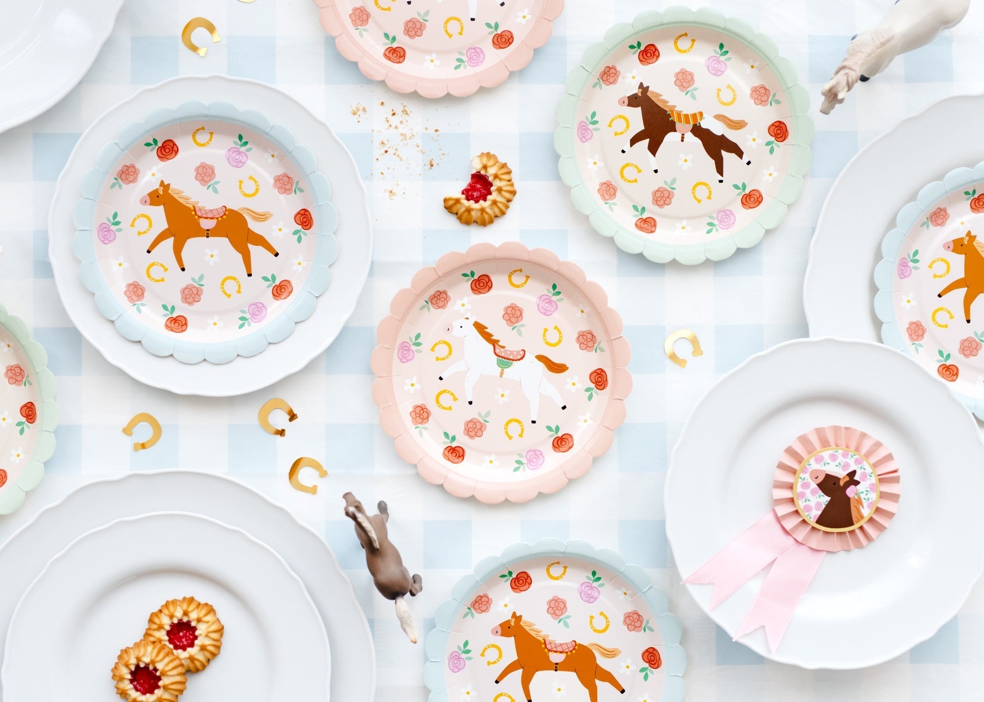 Horse themed paper plates with colorful border for party table