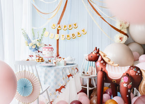 Large standing foil horse balloon with floral design for kids birthday party
