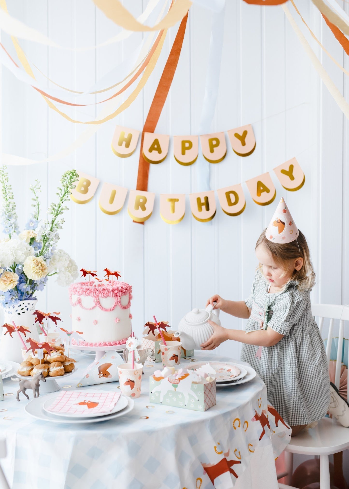 Happy Birthday banner with horses and gold lettering for party decor
