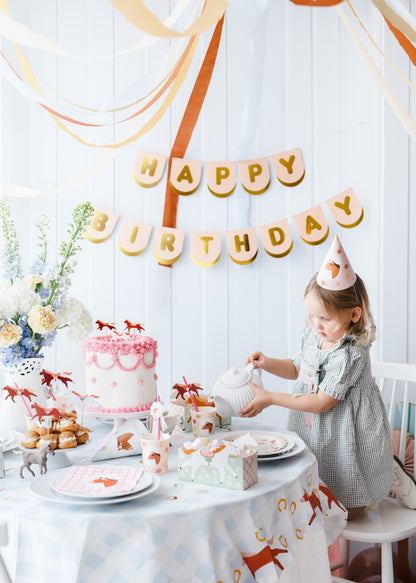 Happy Birthday banner with horses and gold lettering for party decor
