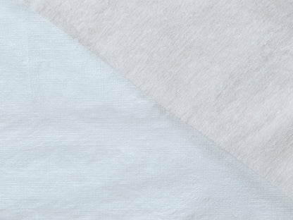 Close-up of textured fabric with a diagonal pattern