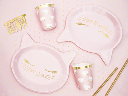 Pink cat-shaped paper plates with gold whiskers and details, ideal for serving snacks or cake at kitty-themed parties.