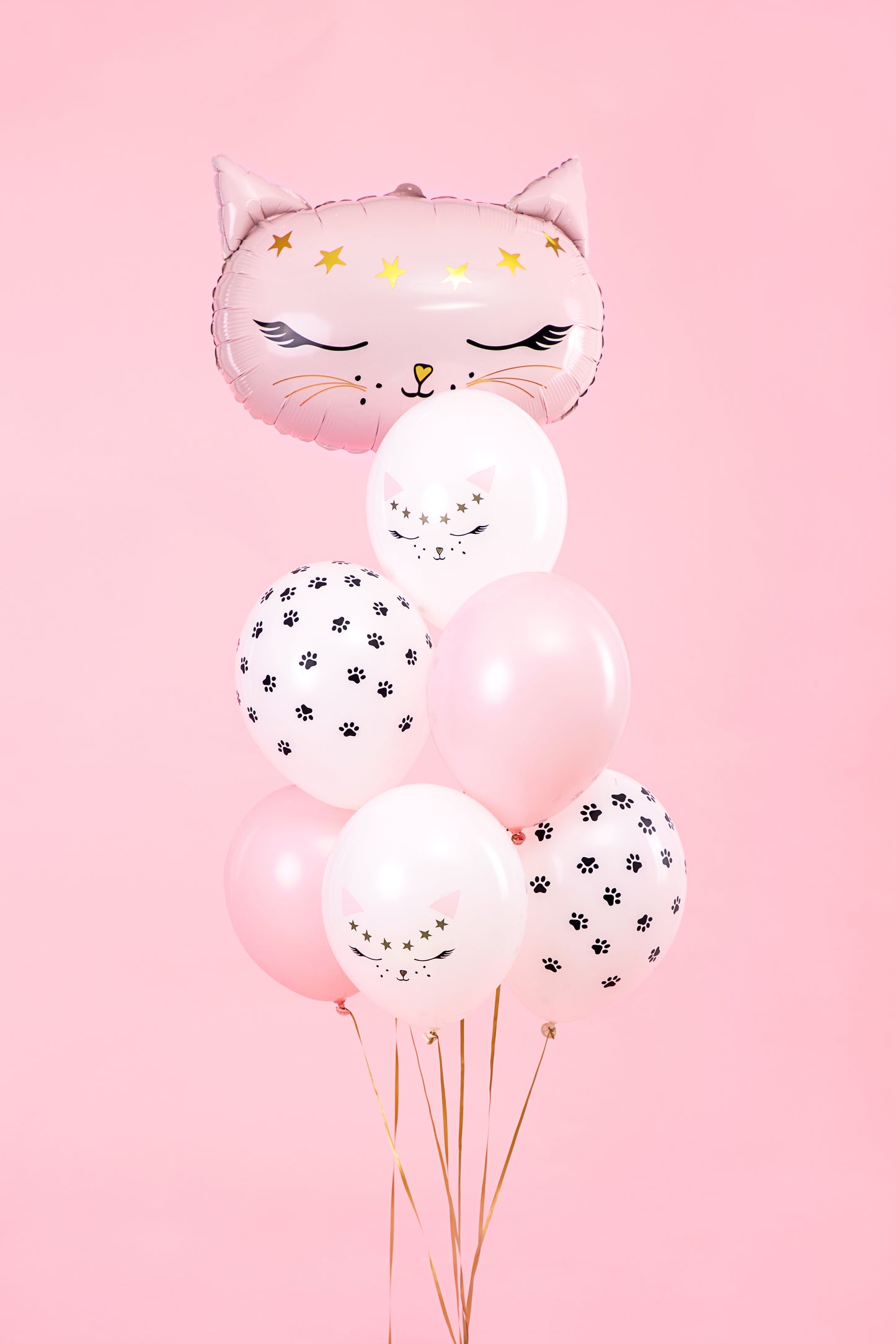Set of pastel kitty-themed latex balloons with paw prints and cat faces, ideal for birthday decor and kids' parties.