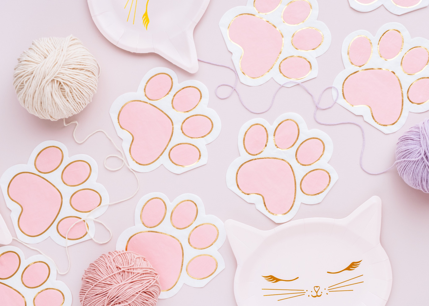 Cute napkins shaped like a pink paw print, perfect for animal-themed or kitty birthday parties.