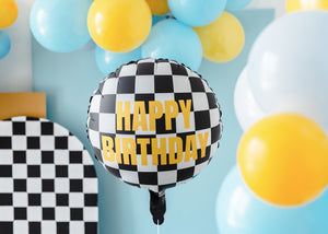 Foil balloon with checkered pattern and "Happy Birthday" text.