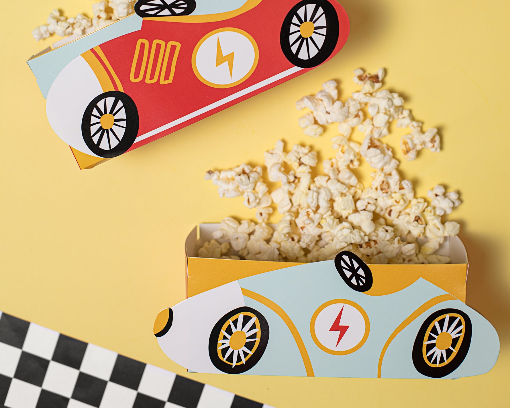 Popcorn in a race car-themed snack boxes 