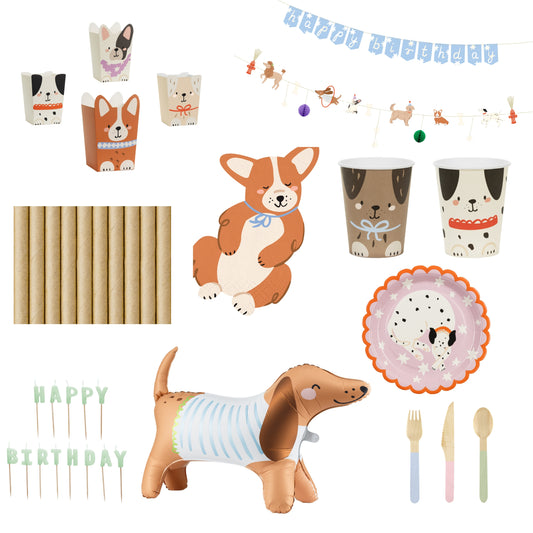 Collection of dog-themed party supplies including cups, straws, balloons, and utensils on a white background.