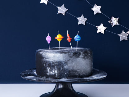 Space-themed birthday candles set with planet, balloon, Earth, and rocket designs