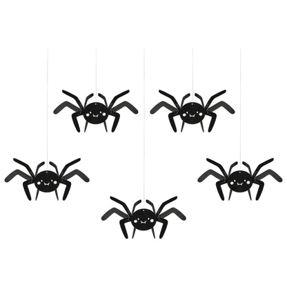 Set of six black spider decorations on a white background