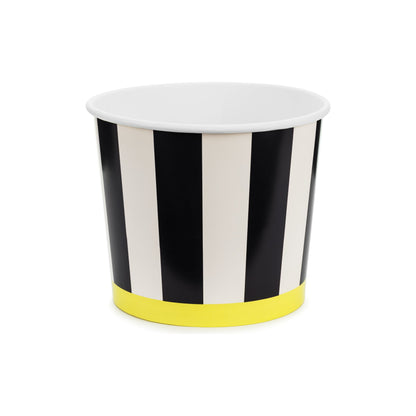Black and white striped cup with a yellow base on a white background