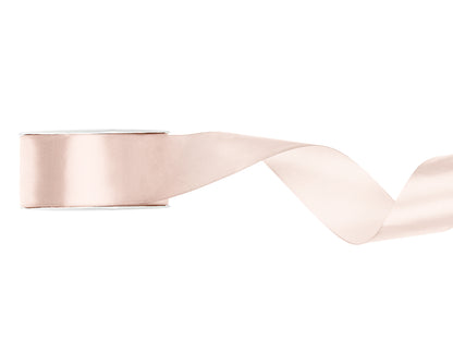 Rose gold ribbon on a white background