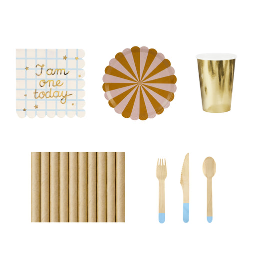 Collection of party supplies including a paper plate, straw, and cutlery on a white background