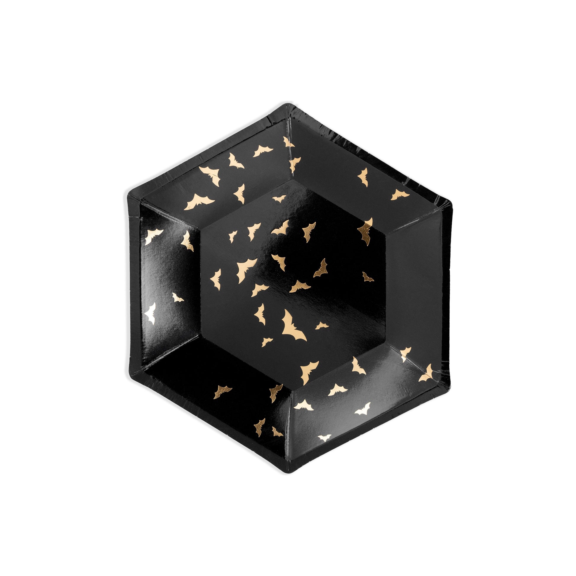 Black hexagonal plates with gold bat patterns on a white background