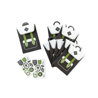 Packaging of small bags with green straps and a set of stickers on a white background
