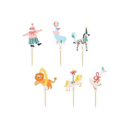 Set of six circus-themed cupcake toppers featuring a clown, seal with ball, zebra with balloons, lion jumping through a hoop, carousel horse, and goose with a red bow