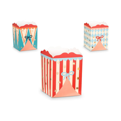Set of three popcorn or snack boxes with circus tent patterns in red, blue, and pastel designs decorated with stars and bows