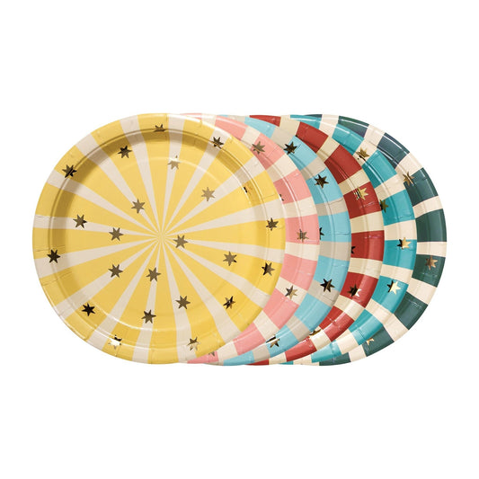 Colorful set of round paper plates with circus stripe patterns in yellow, pink, turquoise, red and dark green, decorated with golden stars
