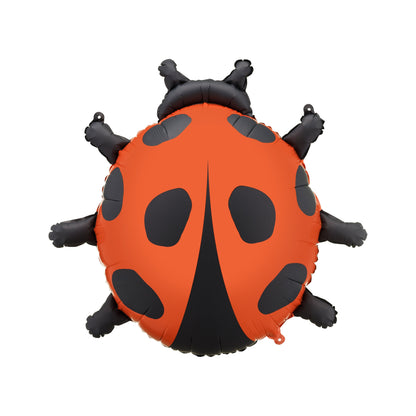 Red and black ladybug shaped foil balloon, charming and playful decoration for kids or garden parties