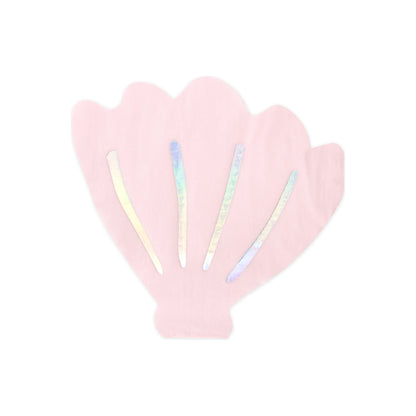 Pink paper napkins shaped like seashells with holographic accents — perfect for mermaid birthday party table settings.