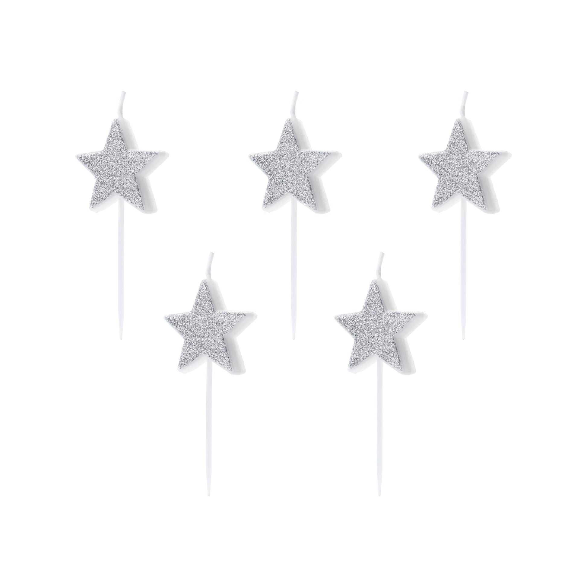 Silver glitter star birthday candles for space-themed cake decor