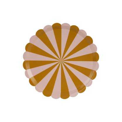 Round paper plates with mustard and blush pink stripes, fun and colorful party tableware