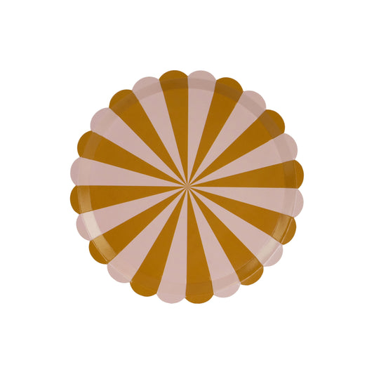 Round paper plates with mustard and blush pink stripes, fun and colorful party tableware